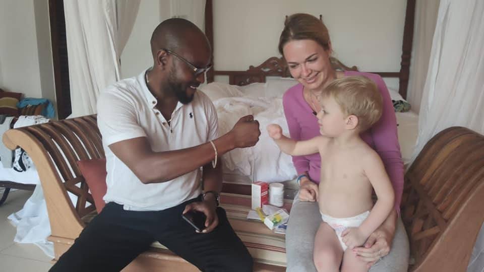 Doctor visiting a guest in a hotel room